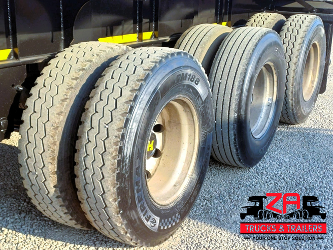 2023 HENRED FRUEHAUF TRI-AXLE FLAT DECK
